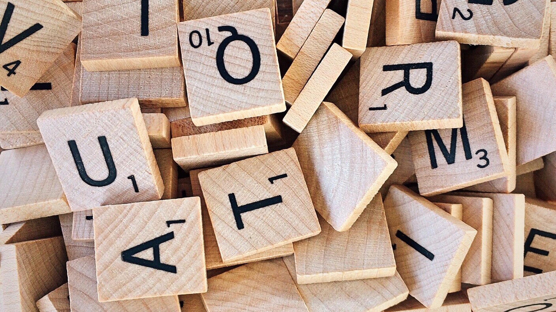 Scrabble tiles help us form four-letter words